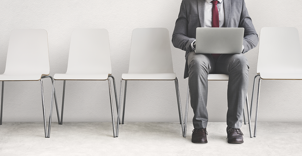 man alone with laptop